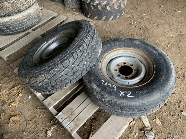 (2) 16 inch trailer tires on 8 bolt rims